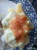Papa con carne, queso y guiso