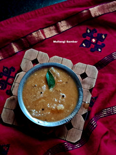 A picture of Mullangi Sambar / Mooli ka sambar.