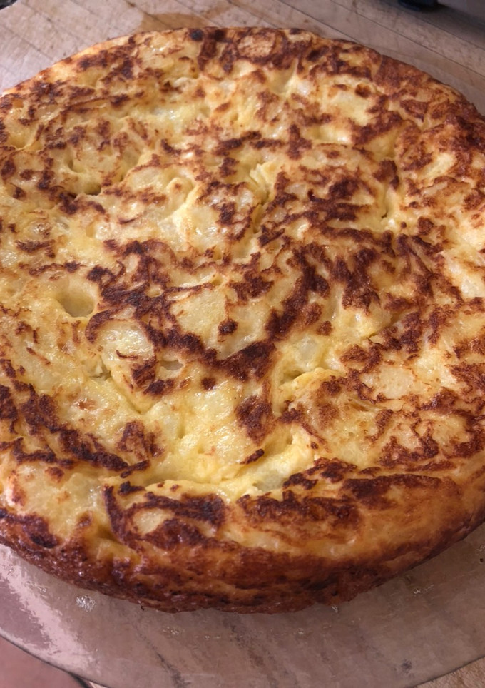 Una foto de Tortilla de patatas con cebolla