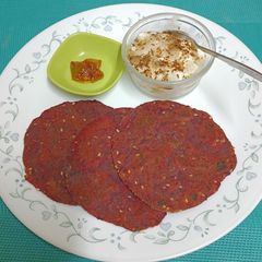 A picture of Beetroot & Sesame Rotis.