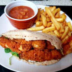 My Hot n Spicy Chicken in a pitta bread. 😁 A picture of My Hot n Spicy Chicken in a pitta bread. 😁.