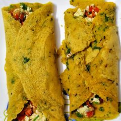 A picture of Stuffed besan chilla.