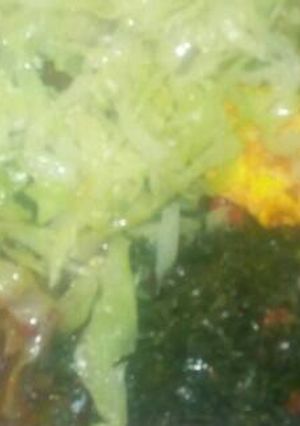 A picture of Skuma,fried omelette,cabbage,matumbo.