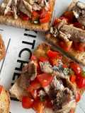 Amalfi Bruschetta with Sardines, Piccolo Tomatoes & Basil