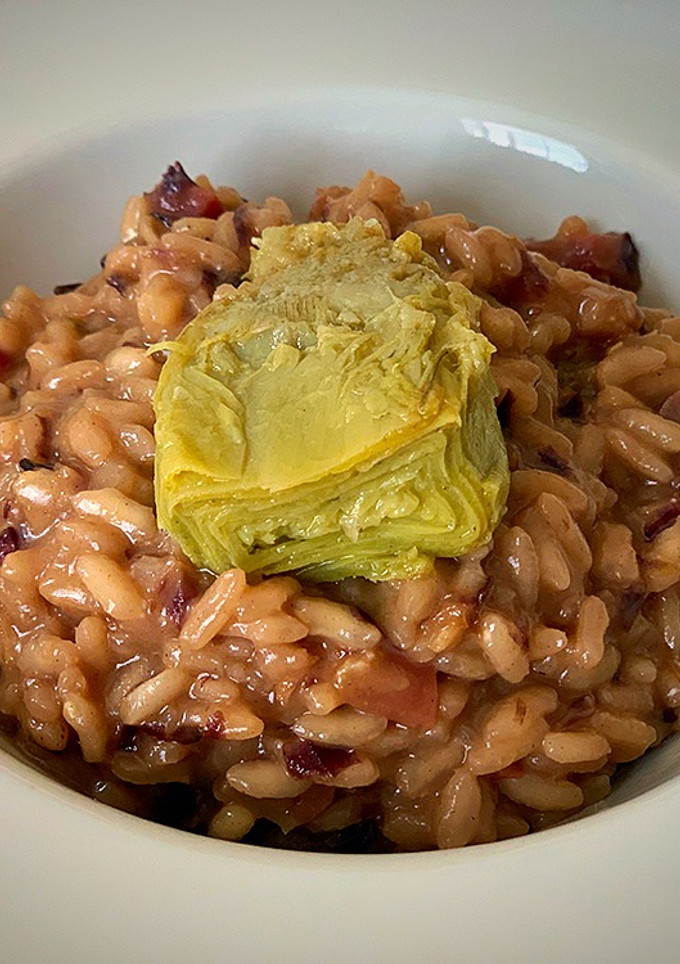 Una foto de Arroz meloso con jamón ibérico, Idiazábal y alcachofa