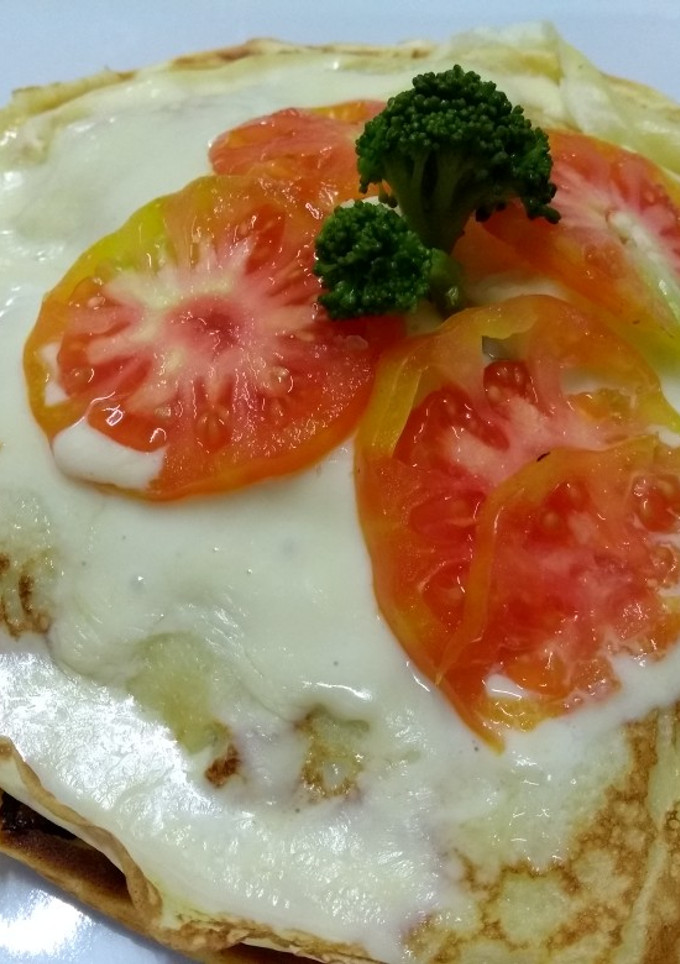 Una foto de Sándwich de panqueques con verduras salteadas, fácil y delicioso