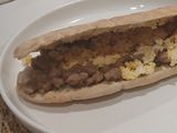 Bocadillo Mudéjar de Jueves Lardero (Longaniza confitada con Huevo rallado)