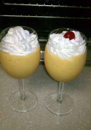 A picture of fresh mango and banana smoothie.