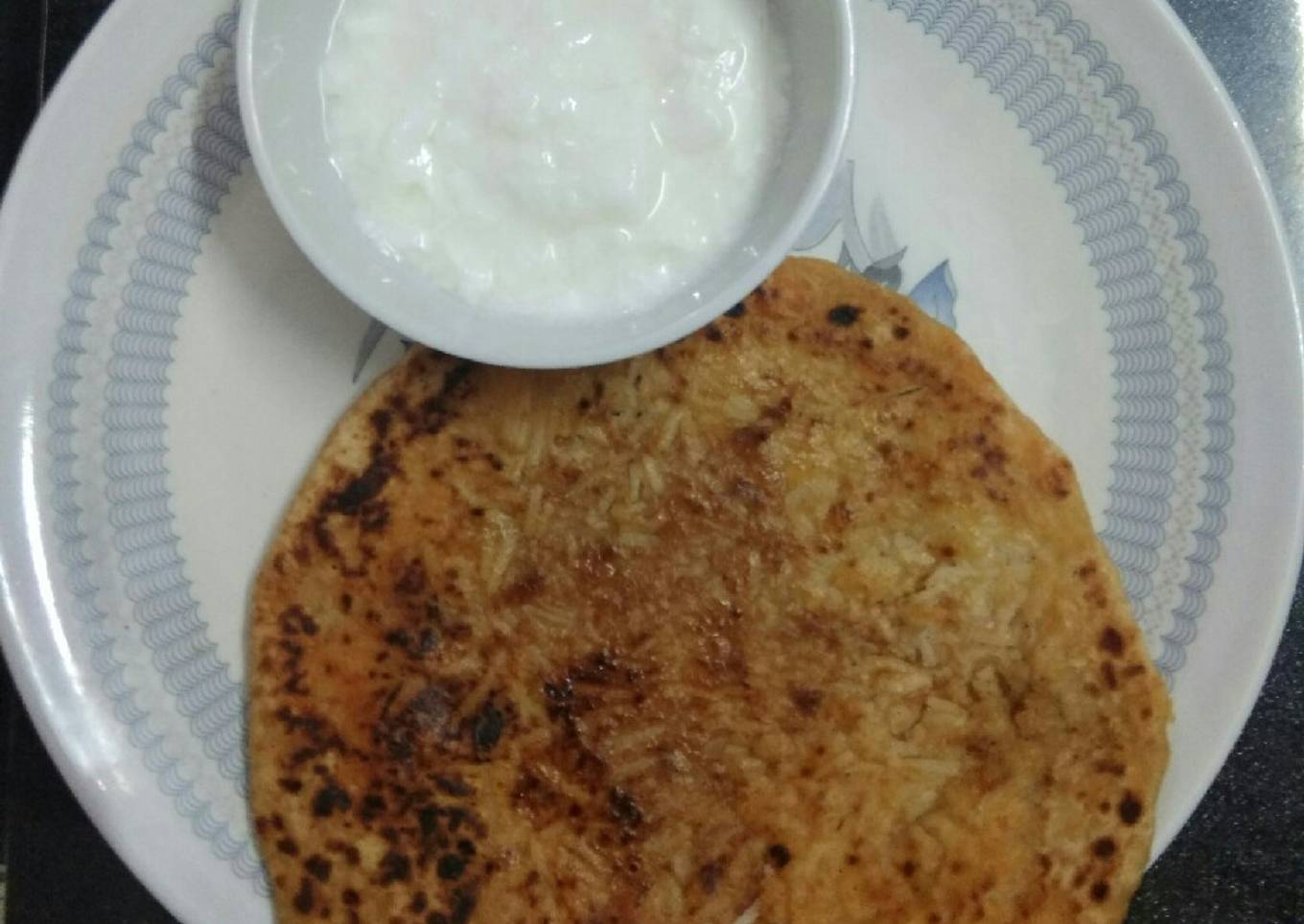 Rice paratha with curd