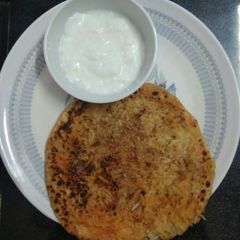 Rice paratha with curd A picture of Rice paratha with curd.