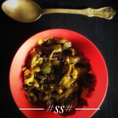A picture of Eggplant with bitter gourd Fry.