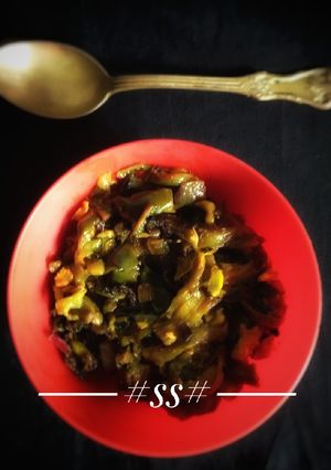 A picture of Eggplant with bitter gourd Fry.