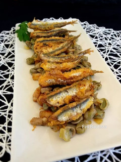 Una foto de Habas con panceta y boquerones