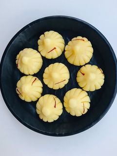 A picture of Instant mawa modak with motichur filling.