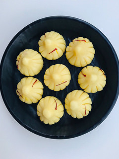 A picture of Instant mawa modak with motichur filling.