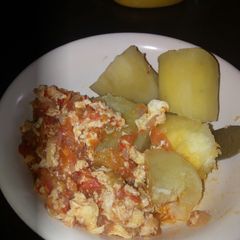 A picture of Sweet potatoes and egg sauce.