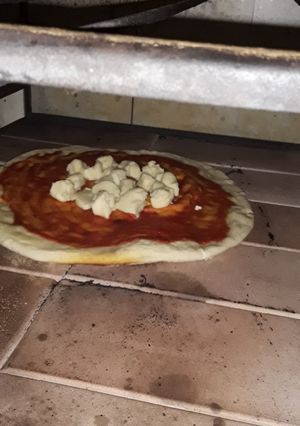 Una foto de Pizza a la piedra