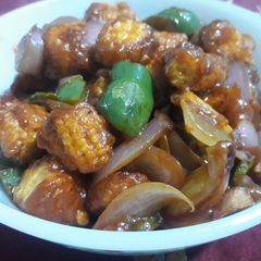 A picture of Babycorn in garlic sauce.