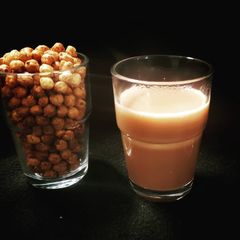 A picture of Roasted chickpea & masala chai.
