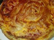 Una foto de quiche de queso brie