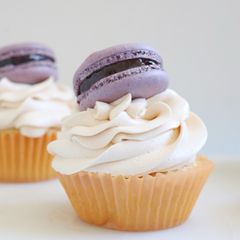 A picture of Brown Sugar & Vanilla Cupcakes with Earl Grey Frosting & Blackberry Macaron.