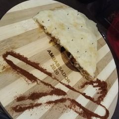 A picture of Araibian pizza bread.