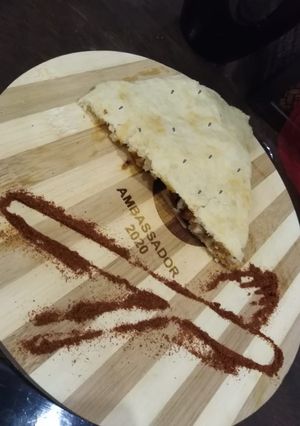A picture of Araibian pizza bread.