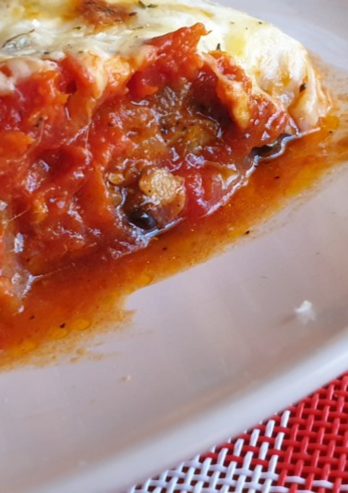 Una foto de Calabacín y berenjena a la parmesana con queso de cabra