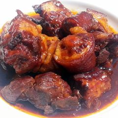 A picture of Pork Tail In BBQ Sauce.