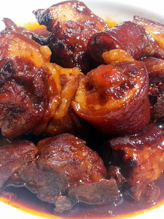A picture of Pork Tail In BBQ Sauce.