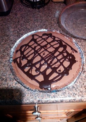A picture of Chocolate Turtle Cheese Cake.