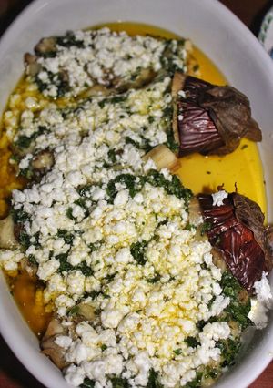 A picture of Aubergine with Olive Oil, Garlic, Parsley and Feta Cheese.