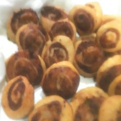A picture of Samosa pinweels/samosa bites.