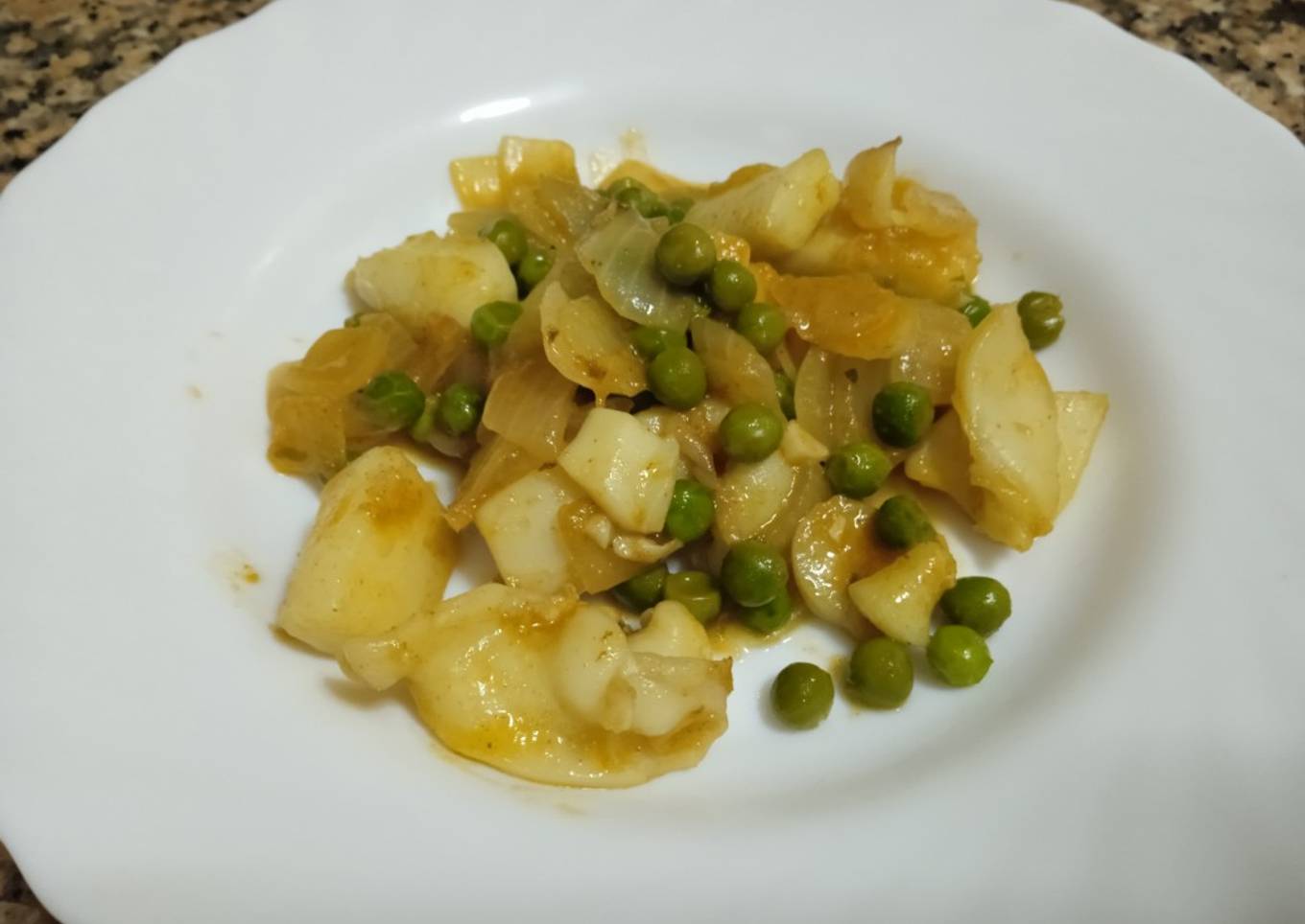 Sepia con guisantes