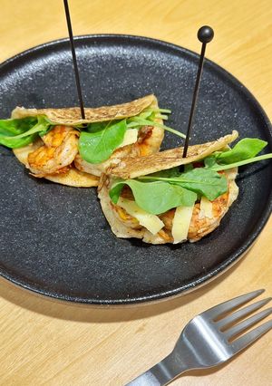 A picture of Mini Flatbreads with Truffle Gouda and Shrimp.