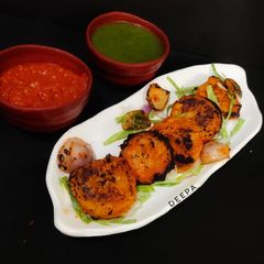 A picture of Tandoori Achari Momos.
