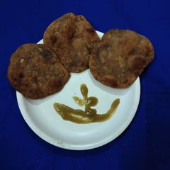 A picture of Kuttu atta Puri(Low oil).
