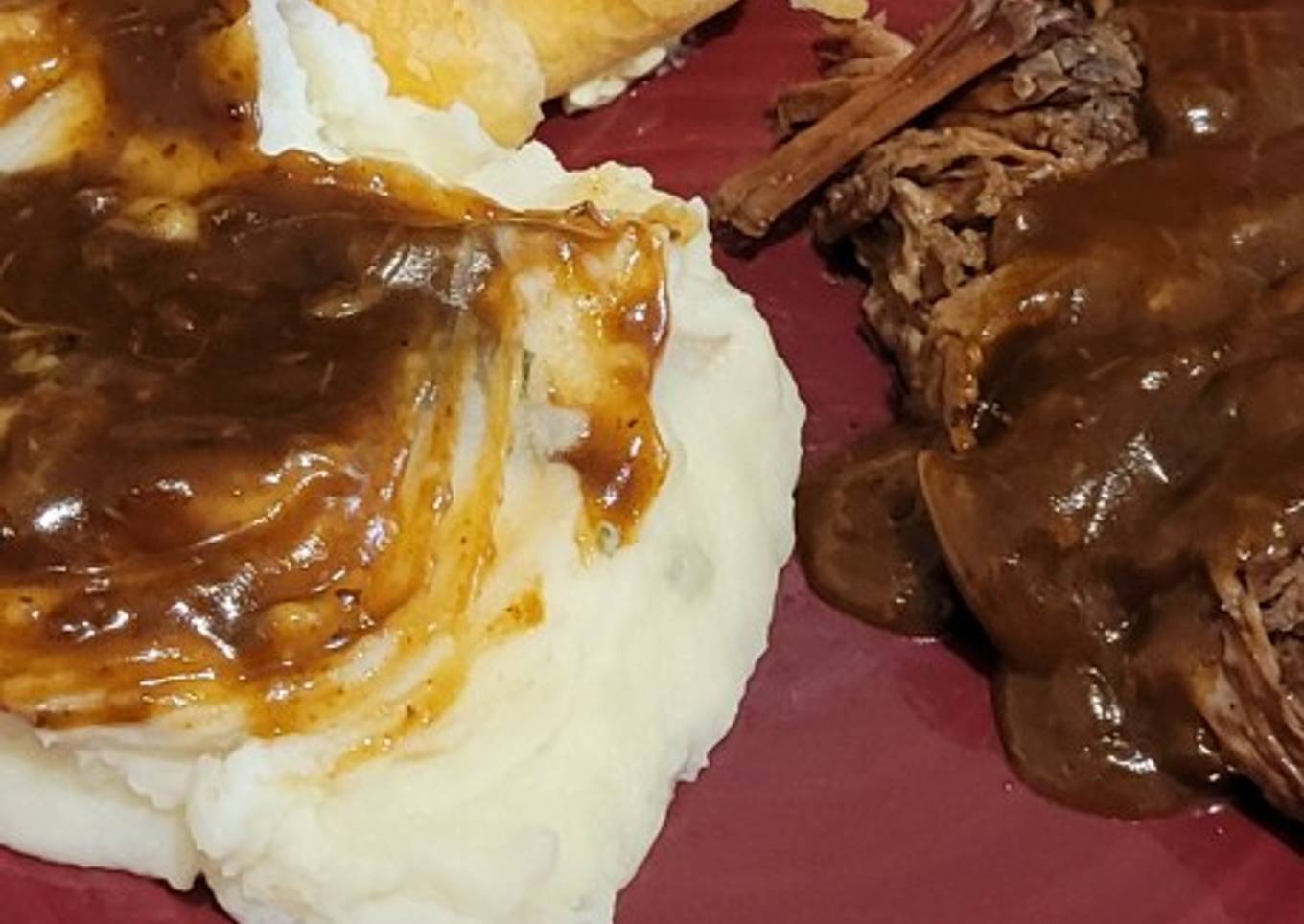 Beef roast with mashed potatoes and beef gravy
