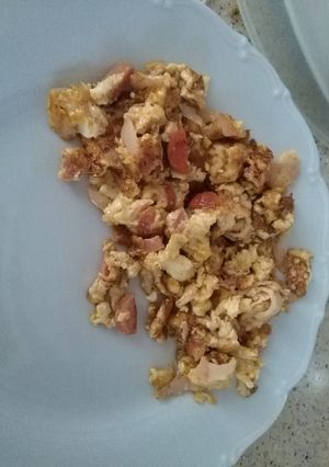 A picture of Omelet with Cocktail Sausages and Smoked Turkey.
