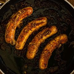 A picture of Pan-Fried Beer and Onion Bratwurst.