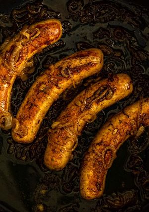 A picture of Pan-Fried Beer and Onion Bratwurst.