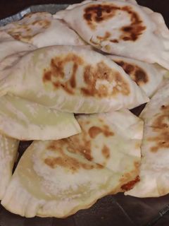 Una foto de 🥟Empanadas de humita calabaza y corazón de queso🤤 en la flip🌽