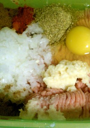 A picture of Chicken meatballs and gravy.