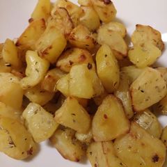 A picture of Pink pepper and rosemary potatoes.