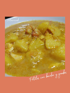 Una foto de Patatas con bacalao y gambas