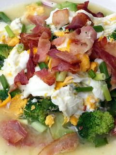 A picture of Brocoli And Egg Broth Top Bacon.