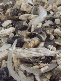 Una foto de Tacos de Huitlacoche correa con cerdo al charanda y jugo de chile güero
