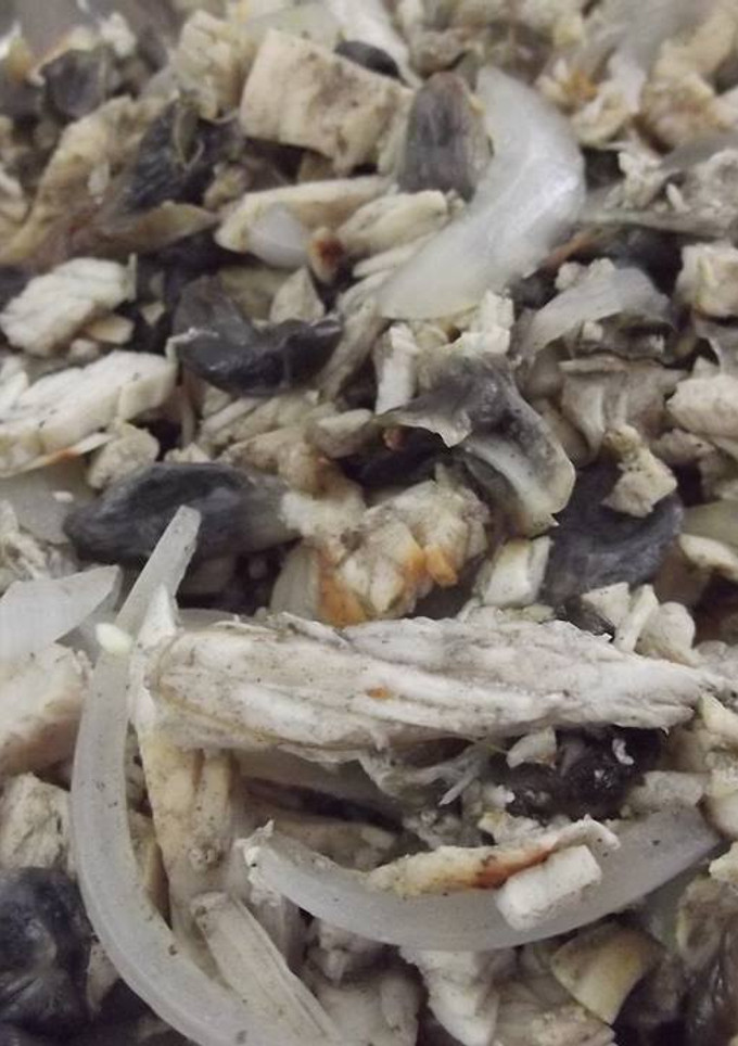 Una foto de Tacos de Huitlacoche correa con cerdo al charanda y jugo de chile güero