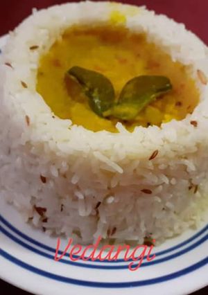 A picture of Jeera rice with Dal tadka.
