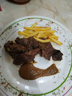 Una foto de Carrillada con ciruelas pasas al vino tinto